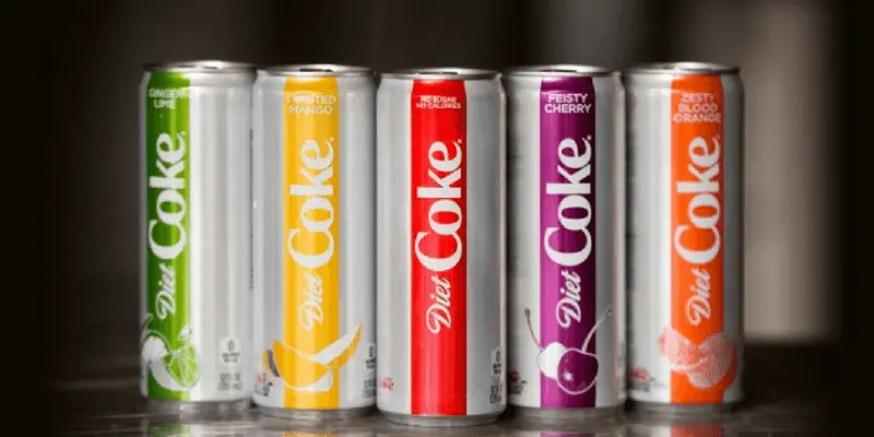 Diet Coke's new slim cans: Ginger Lime, Twisted Mango, original, Feisty Cherry and Zesty Blood Orange