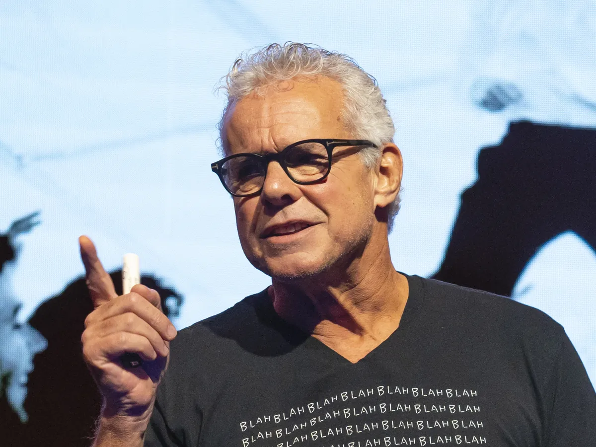 Richard Sauerman speaking on stage